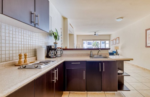 Libertad Apartamento | Beautiful condo with a balcony, kitchen, sparkling pools, & fitness center