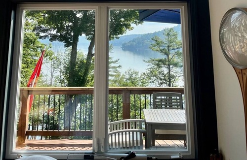 Hadley Casa | Beautiful Great Sacandaga lakefront home. Sleeps 8+. 96' private beach & dock.