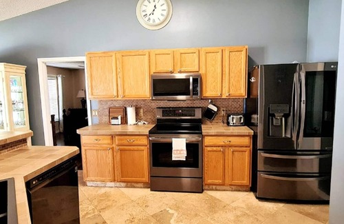 Port Saint Lucie Casa | Beautiful Home in East Port St Lucie. Heated and Screened Saltwater Pool