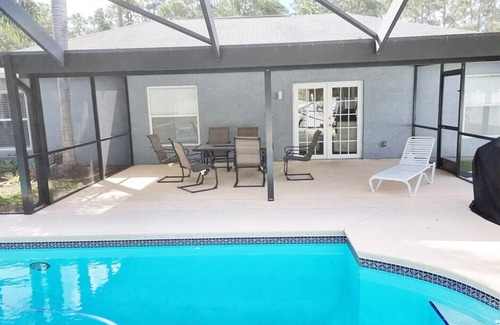 Port Saint Lucie Casa | Beautiful Home in East Port St Lucie. Heated and Screened Saltwater Pool