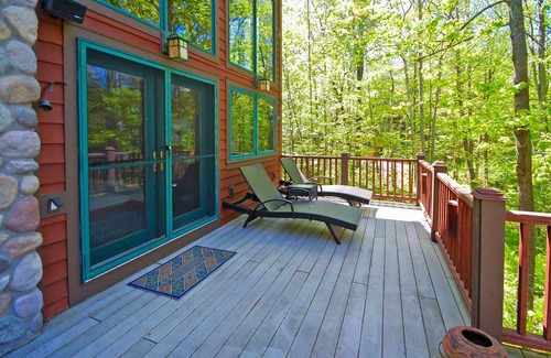 Empire Casa | Beautiful home on Little Glen Lake with a pool table, dock, fireplace, AC