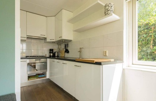 Oude-Tonge Casa | Beautiful home with roof terrace and a view of the water.