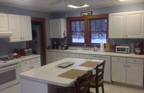 Mikana Casa | Beautiful lake-home, plus separate cottage, 200+ feet level shoreline,1.3 acres