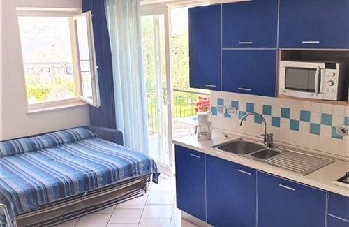 Magugnago Apartamento | Apartamento de nueva construcción con piscina.