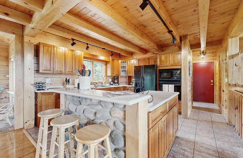 Dundee Casa | Beautiful lake view home with decks, grill, soaking tub & fireplace