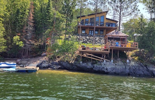 Sioux Narrows Nestor Falls Cabaña | Beautiful modern lake house with hot tub, lakefront.