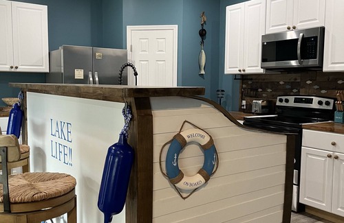 Dandridge Casa | Beautiful new construction lake themed lake house with gameroom and boat bar.