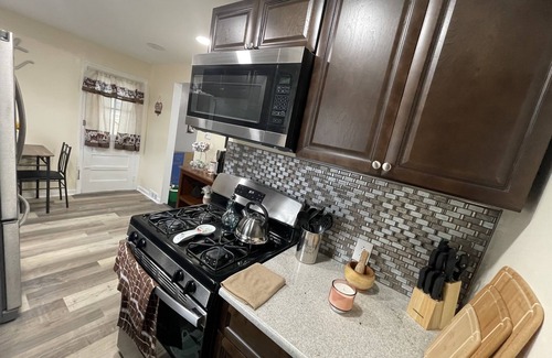 Sharon Hill Casa | Beautiful newly renovated home near airport with fireplace & sunroom.