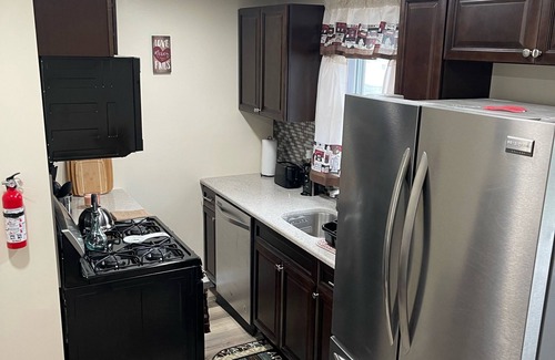 Sharon Hill Casa | Beautiful newly renovated home near airport with fireplace & sunroom.