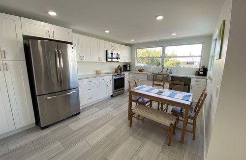 Key Largo Village Casa | Beautiful Remodeled Home on the Water! 40 ft dock & short walk to private beach!
