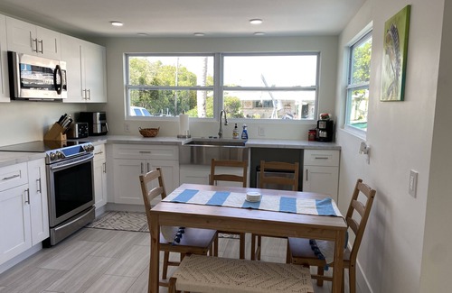 Key Largo Village Casa | Beautiful Remodeled Home on the Water! 40 ft dock & short walk to private beach!