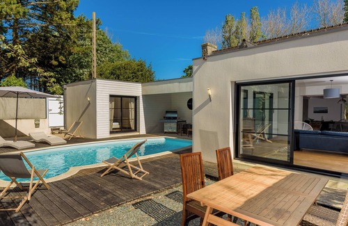 Plomeur Villa | Beautiful renovation of a farmhouse with modern extension, overlooking a swimming pool.