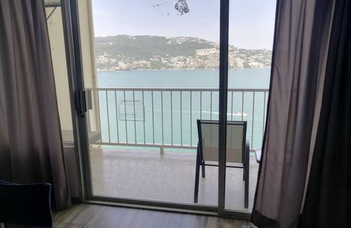 Club Deportivo Apartamento | Bonita Suite Twin Towers con balcón e impresionantes vistas al mar
