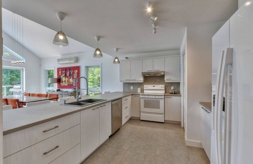 Mille-Isles Chalet De Esquí | Beautiful waterfront cottage on a pristine lake in Morin Heights