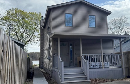 Norton Shores Casa | Beautiful Waterfront Getaway on Mona Lake in Norton Shores
