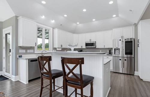 Rock Hill Casa | Beautiful Waterfront Home with abundant outdoor seating, pool, hot tub, grill