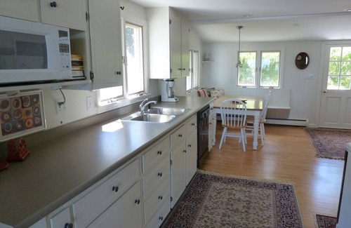 Raymond Casa | Beautifully landscaped home on Panther Pond just 20 feet from the shore!