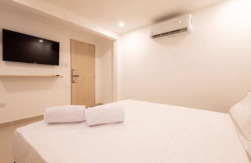 Manga Hotel | nuevo hotel casa boutique habitacion 105 aire tv minibar baño privado wifi
