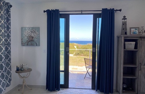 Jobos Casa | Bella Dunes - Luxury Oceanfront Home, Steps from Jobos Beach