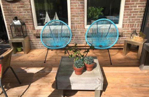 Anjum Casa | BelleMare Bungalow Lauwersmeer mit überdachte Veranda und eingezäuntem Garten