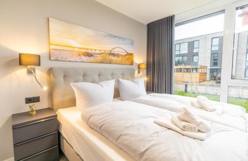 Marienleuchte Apartamento | BeltBlick 20 - Moderne Ferienwohnung direkt an der Ostsee mit Meerblick & Sauna!