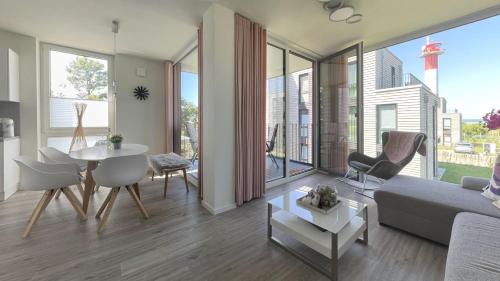 Marienleuchte Apartamento | BeltBlick Fehmarn - moderne Ferienwohnung mit Meerblick und Sauna - Neubau