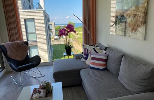 Marienleuchte Apartamento | BeltBlick Fehmarn - moderne Ferienwohnung mit Meerblick und Sauna - Neubau