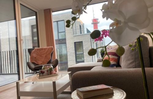 Marienleuchte Apartamento | BeltBlick Fehmarn - moderne Ferienwohnung mit Meerblick und Sauna - Neubau