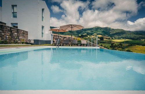 Povoacao Cabina | Benilde Village House