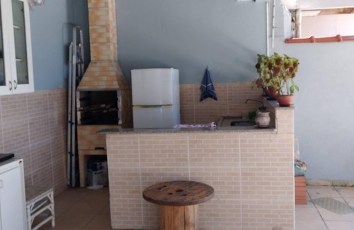 Centro Casa | Bertioga on the Beach, Bedroom with Bathroom. Edicule. parking. Wifi