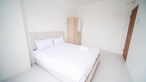 Surabaya Apartamento | Best Choice 2BR at Puncak Dharmahusada Apartment Surabaya By Travelio