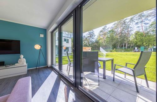 Krakow am See Apartamento | Bewusstsein - Modernes Apartment mit Terrasse, Walk-In-Dusche & Wellnesszugang
