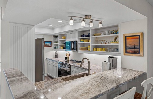 Gasparilla Island Condominio | BG North 54, a charming 2-bedroom condo in Boca Grande with stunning Gulf views.