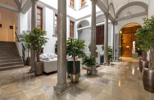 Distrito Central Apartamento | BiBo Suites Palacio de Portago