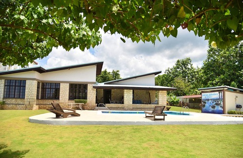 Whitehouse Villa | Villa de 5 dormitorios frente a la playa