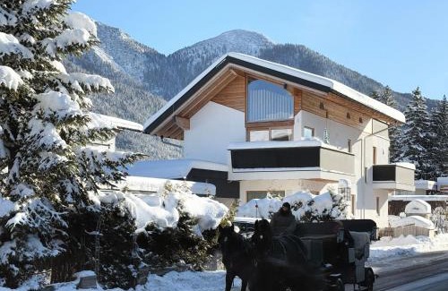Seefeld in Tirol Apartamento | Bio Ferienwohnung am Wildsee in Seefeld mit E-Ladestation