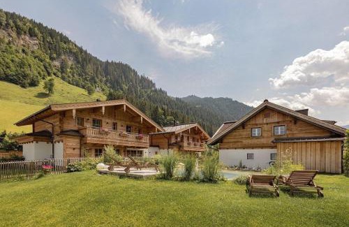 Grossarl Casa | Birnbaum Chalet Kreuzkogel mit Naturbadesee und eingezäunten Garten