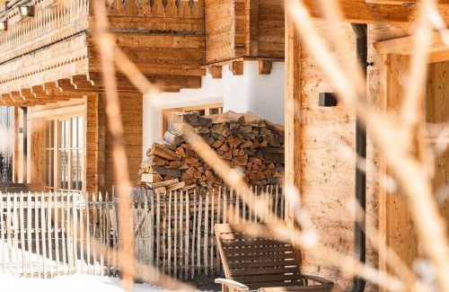 Grossarl Casa | Birnbaum Chalet Kreuzkogel mit Naturbadesee und eingezäunten Garten