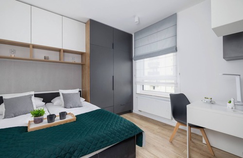 Grzegorzki Apartamento | Black and Grey Apartment by Renters