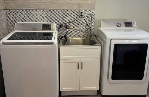 Miller Beach Apartamento | Blocks from the beach with giant covered deck, firepit, and grill!