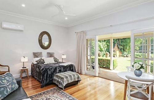 Bonville Casa | Blossom is a country house studio set amid beautiful classic country gardens in Bonville.