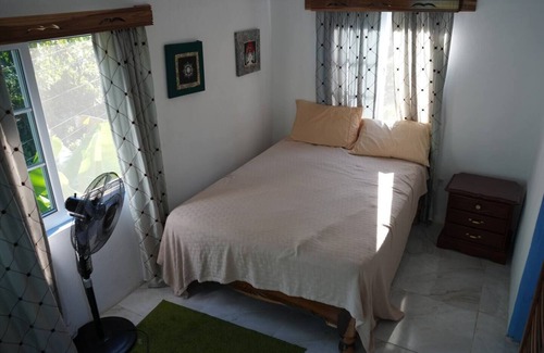 Fairy Hill Casa | Blue Balcony Room at Robin Hood guest house