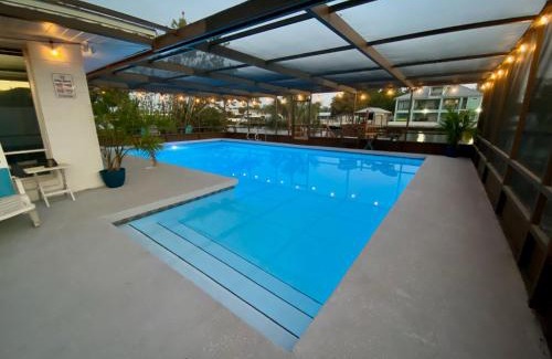 Ruskin Casa | Blue Heron House, Private 4 BR Waterfront w Heated Pool and Fire Pit