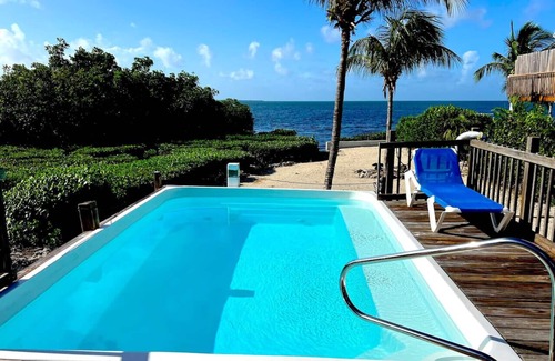Cudjoe Key Casa | Blue Vacation Home, piscina privada climatizada, muelle.