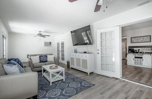 Palma Sola Casa | Blue Palm Home with Pool, Hot Tub, Nearby Beach, Outdoor Shower