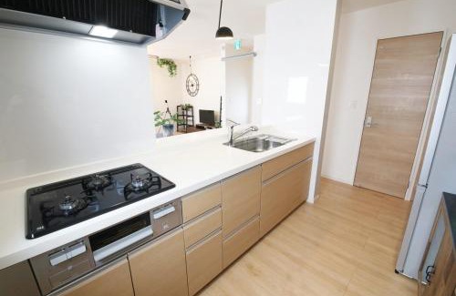 Ojima Island Apartamento | blue sea and house