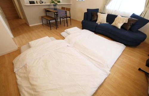 Ojima Island Apartamento | blue sea and house