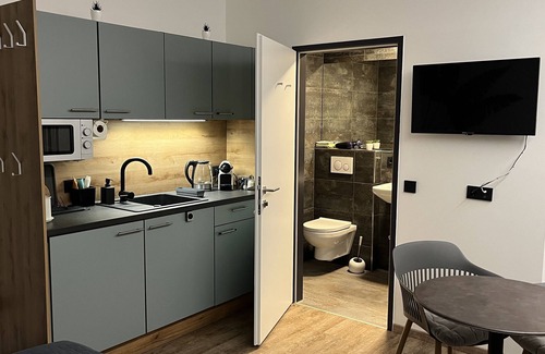 Linz Apartamento | Blue Tropic Retreat