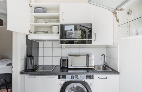 Breite Apartamento | Blueground | Breite, elev, washer, balcony