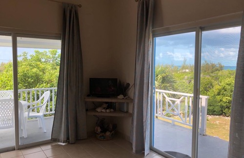 Rainbow Bay Cabaña | Blueskies, una casa de vacaciones magnífico en Rainbow Bay, Eleuthera